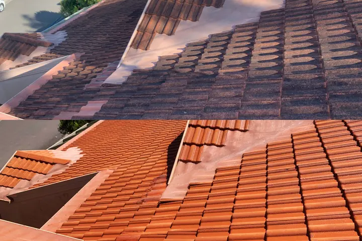 Concrete tile roof around a valley flashing, before and after cleaning: dark tiles above, clean orange tiles below.
