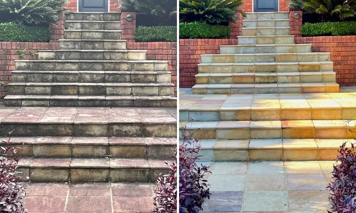 Wide sandstone front steps between brick planters, before and after pressure washing: grey and weathered on the left, clean yellow sandstone on the right.