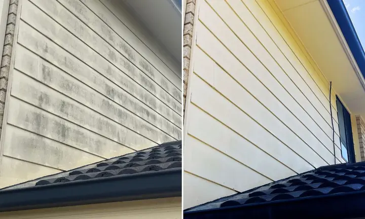 Cream weatherboard wall above a tiled roof, before and after a house wash: grey mould streaks on the left, clean on the right.